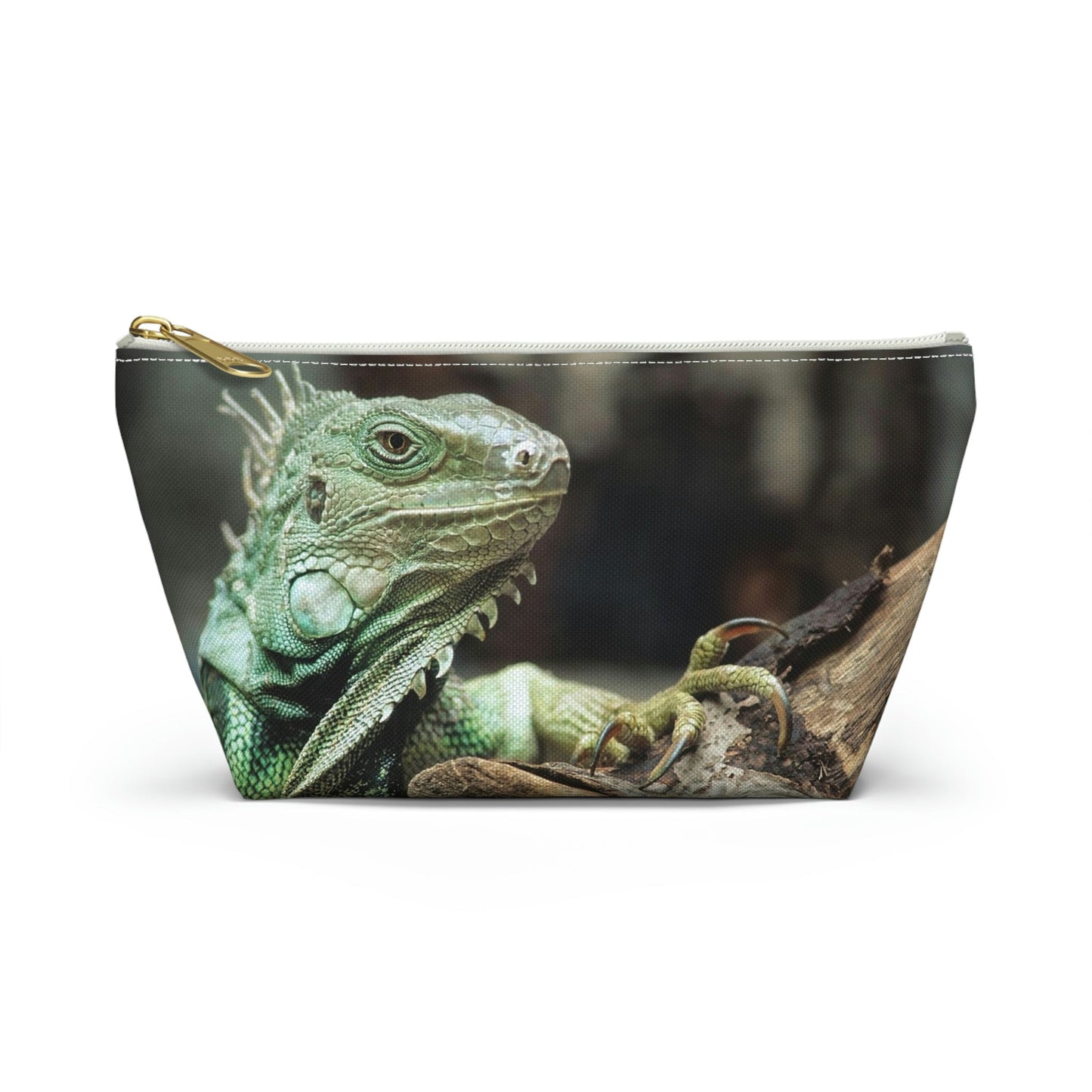 Front view of the small 8.75 x 4.75 x 2.25 inch kit bag with green iguana design and white zipper.