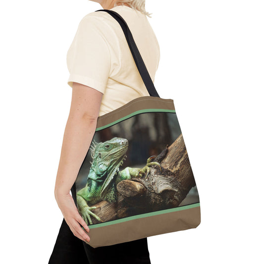 Young woman with a tote bag featuring the green iguana design draped across her shoulder.