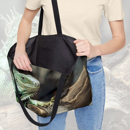 A woman holding open a weekender bag featuring the green iguana design, showcasing the roomy interior.