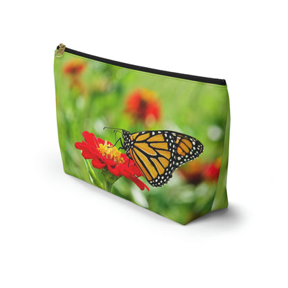 Front view of the kit bag with butterfly on flower design angled to showcase the depth and all over print design.