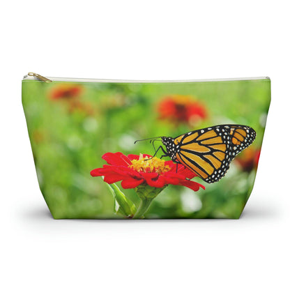 Front view of the large 12.5 x 7.25 x 3.25 inch kit bag with butterfly on flower design and white zipper.