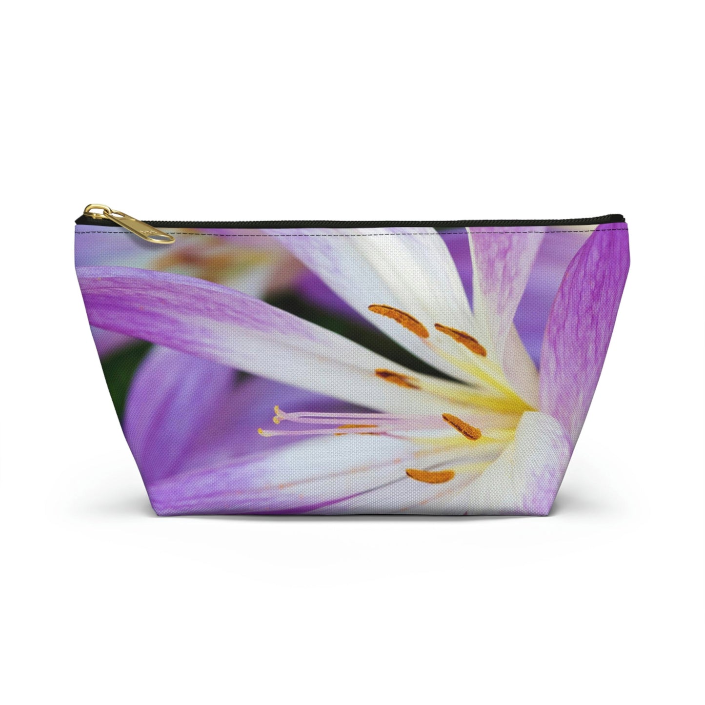 Front view of the small 8.75 x 4.75 x 2.25 inch kit bag with purple flower, orange stamen design and black zipper.
