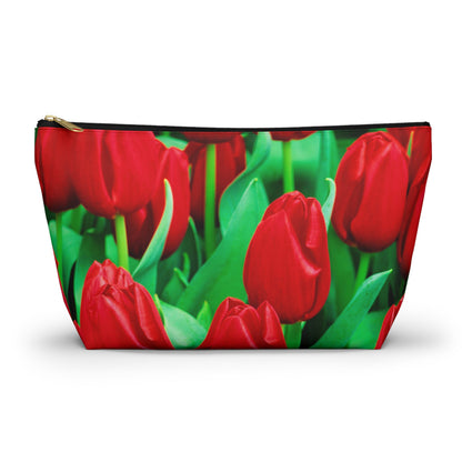 Zippered accessory pouch featuring vibrant photo art close up of brilliant red tulips with bright green stems.