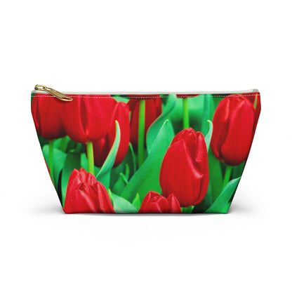 Front view of the small 8.75 x 4.75 x 2.25 inch kit bag with red tulips design and white zipper.