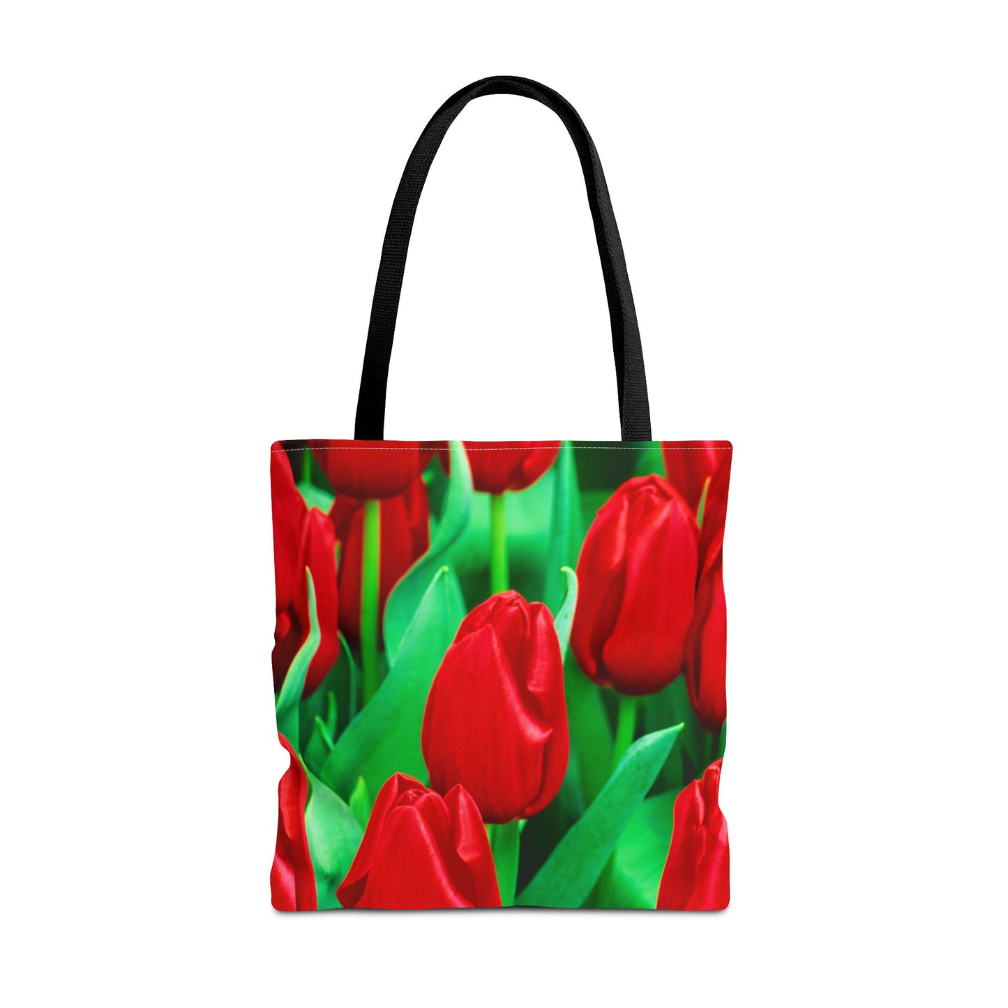 Large 18 x 18 inch tote bag featuring vibrant photo art close up of brilliant red tulips with bright green stems.
