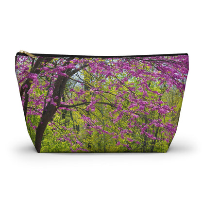 Zippered accessory pouch featuring vibrant photo art of a tree filled with violet colored spring buds and blooms.