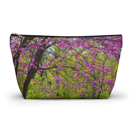 Zippered accessory pouch featuring vibrant photo art of a tree filled with violet colored spring buds and blooms.