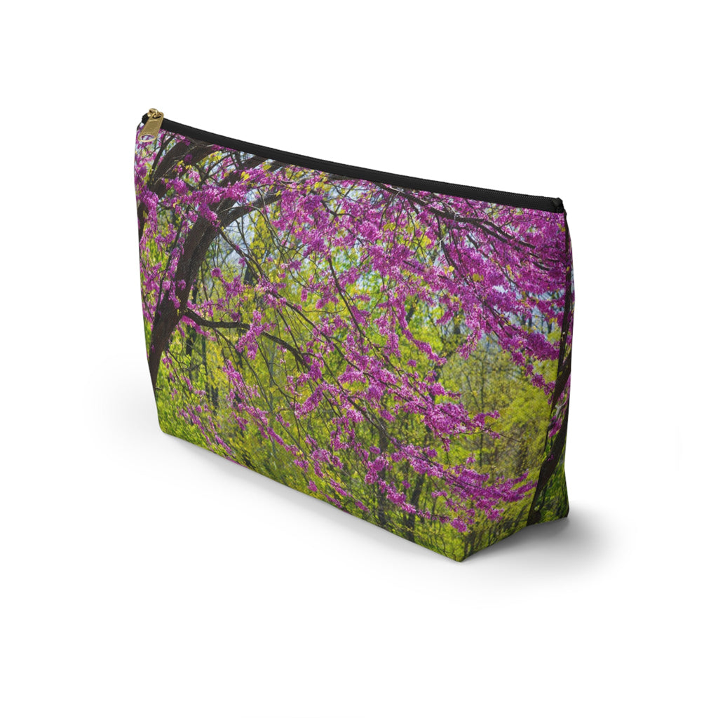 Front view of the kit bag with tree blossoms design angled to showcase the depth and all over print design.