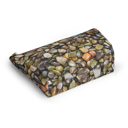 Bottom view of the kit bag with pebbles and stones design angled to showcase the depth and all over print design.