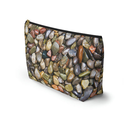 Front view of the kit bag with pebbles and stones design angled to showcase the depth and all over print design.