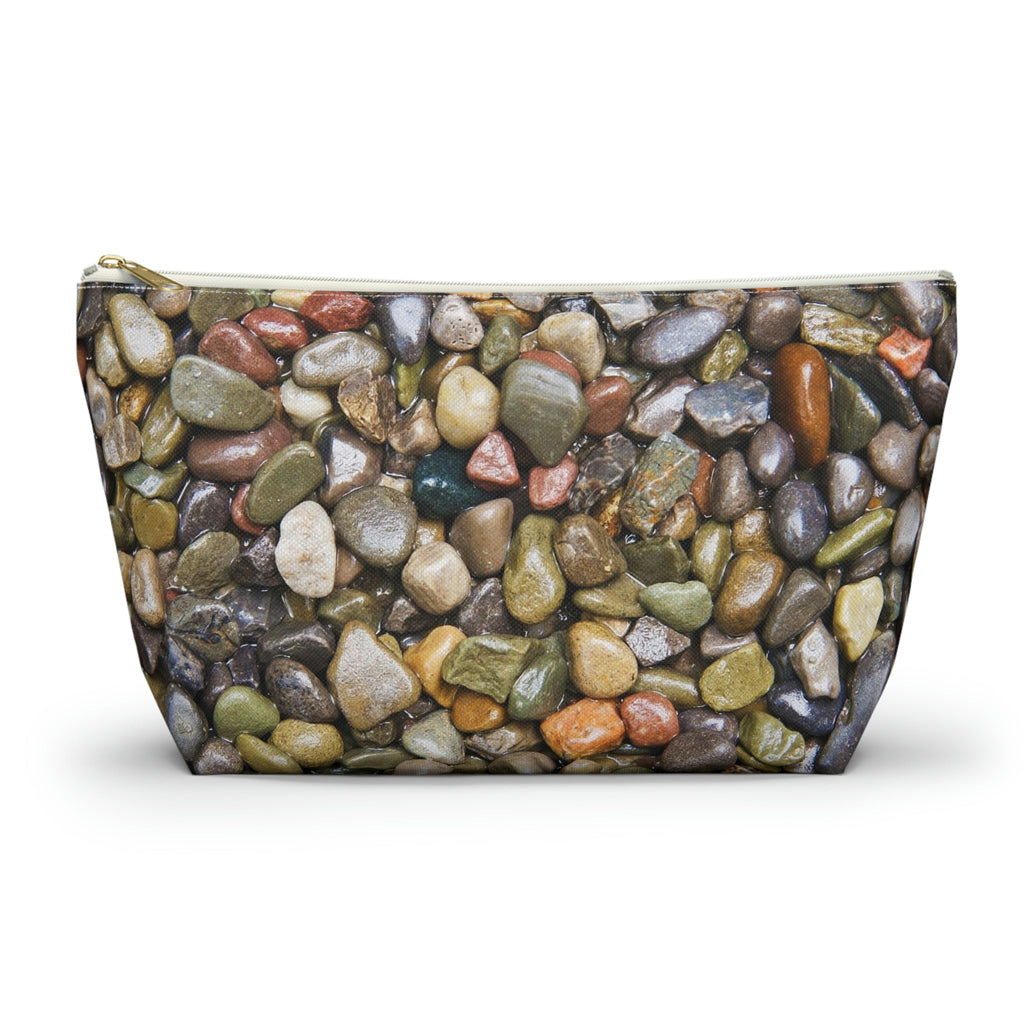 Front view of the large 12.5 x 7.25 x 3.25 inch kit bag with pebbles and stones design and white zipper.