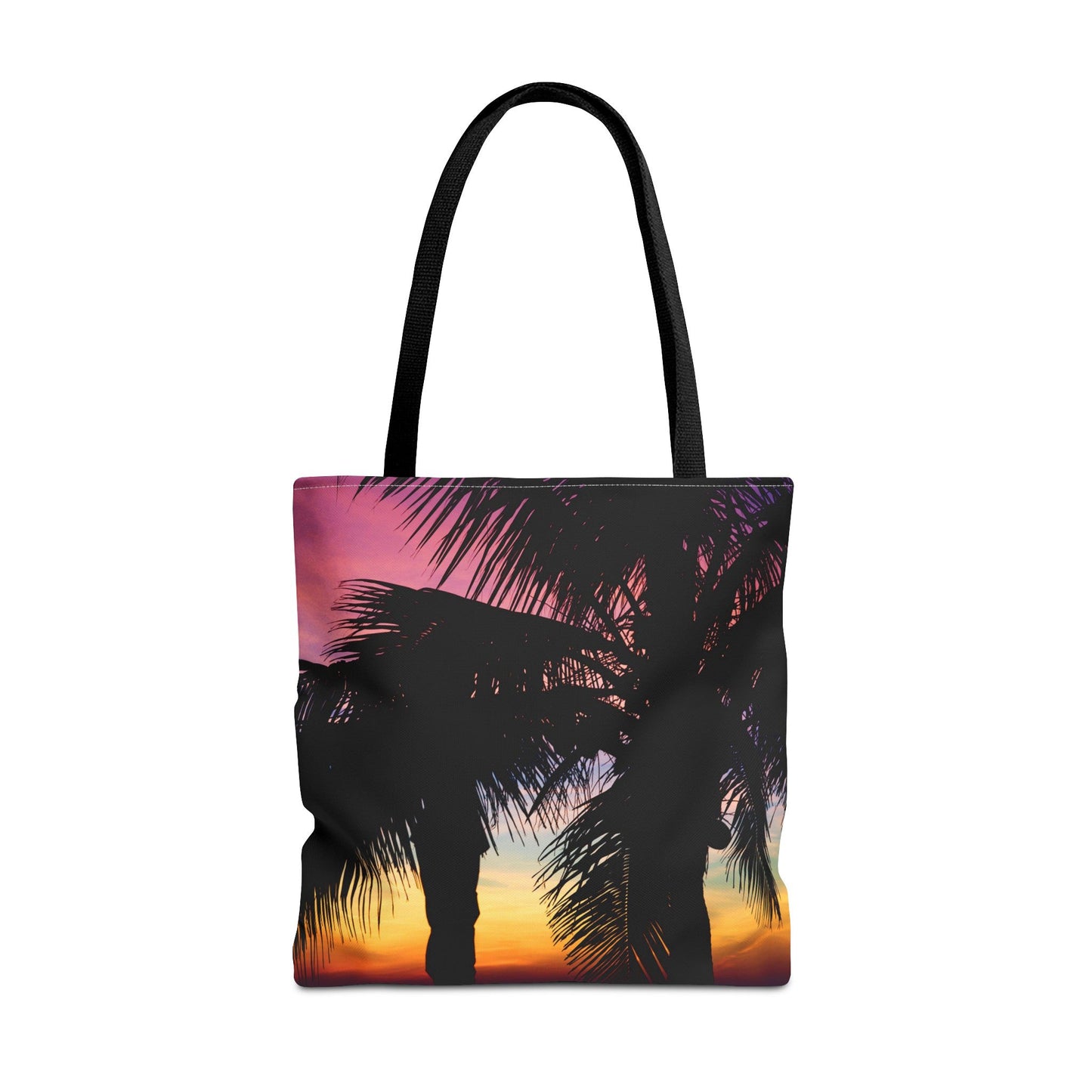 Large 18 x 18 inch tote bag featuring vibrant photo art of intense multi colored sunset with black palm trees in the foreground.