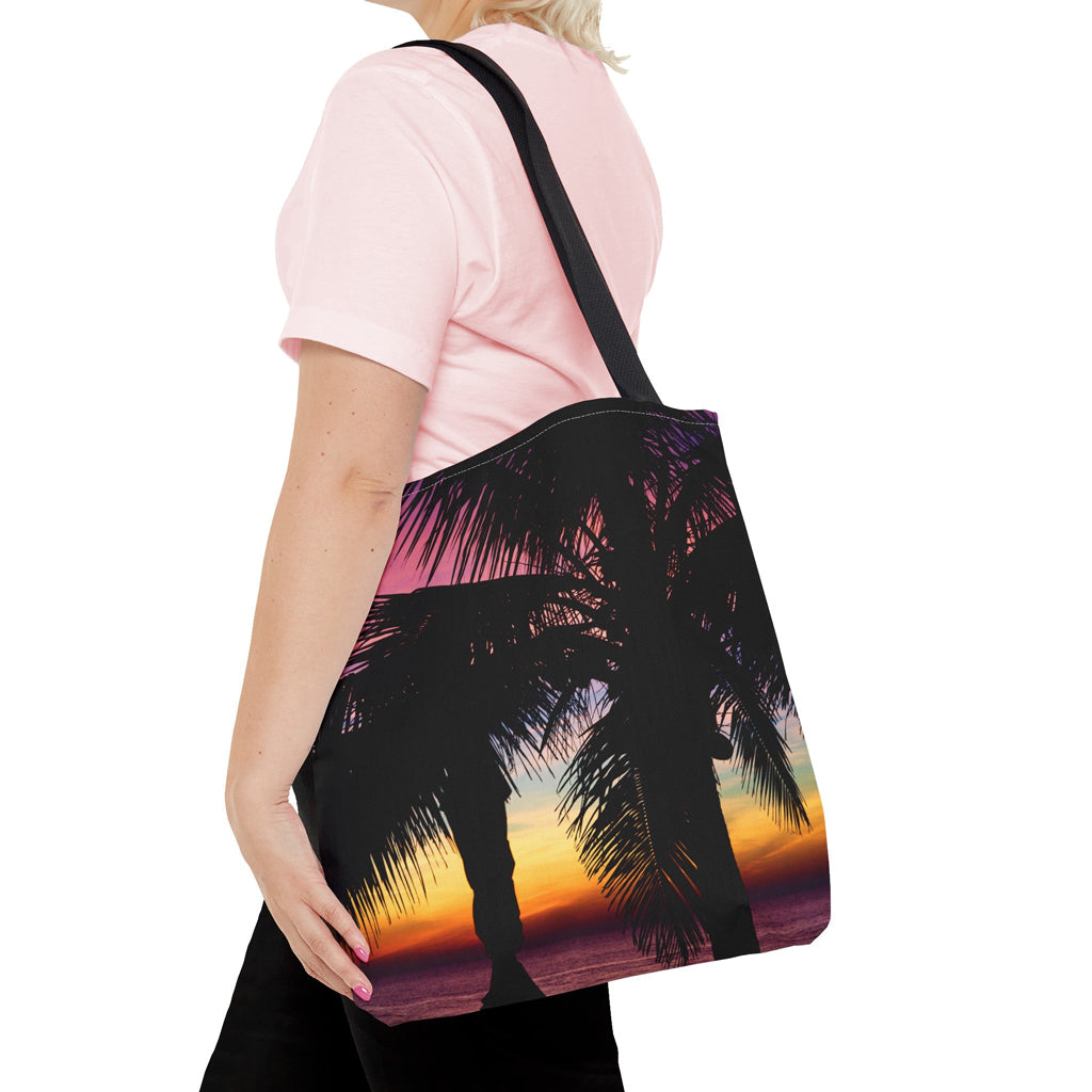 Young woman with a tote bag featuring the intense sunset design draped across her shoulder.