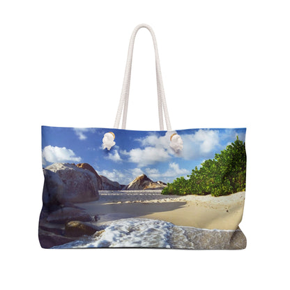 Front view of a beach bag featuring vibrant photo art of Caribbean beach landscape with surf and huge boulders.