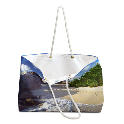 An open view of the beach bag with beach surf design shows the cream colored interior lining.