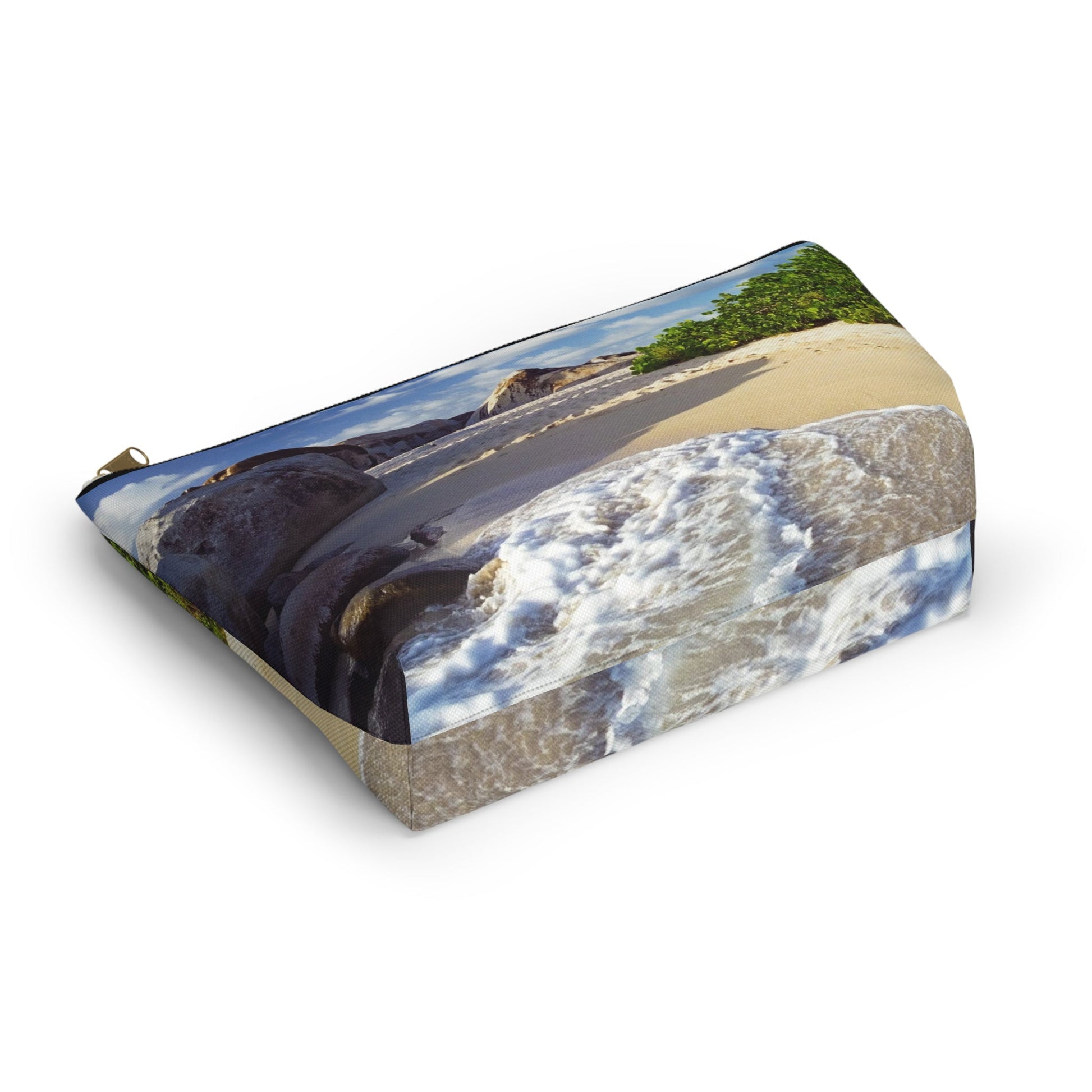 Bottom view of the kit bag with beach surf design angled to showcase the depth and all over print design.