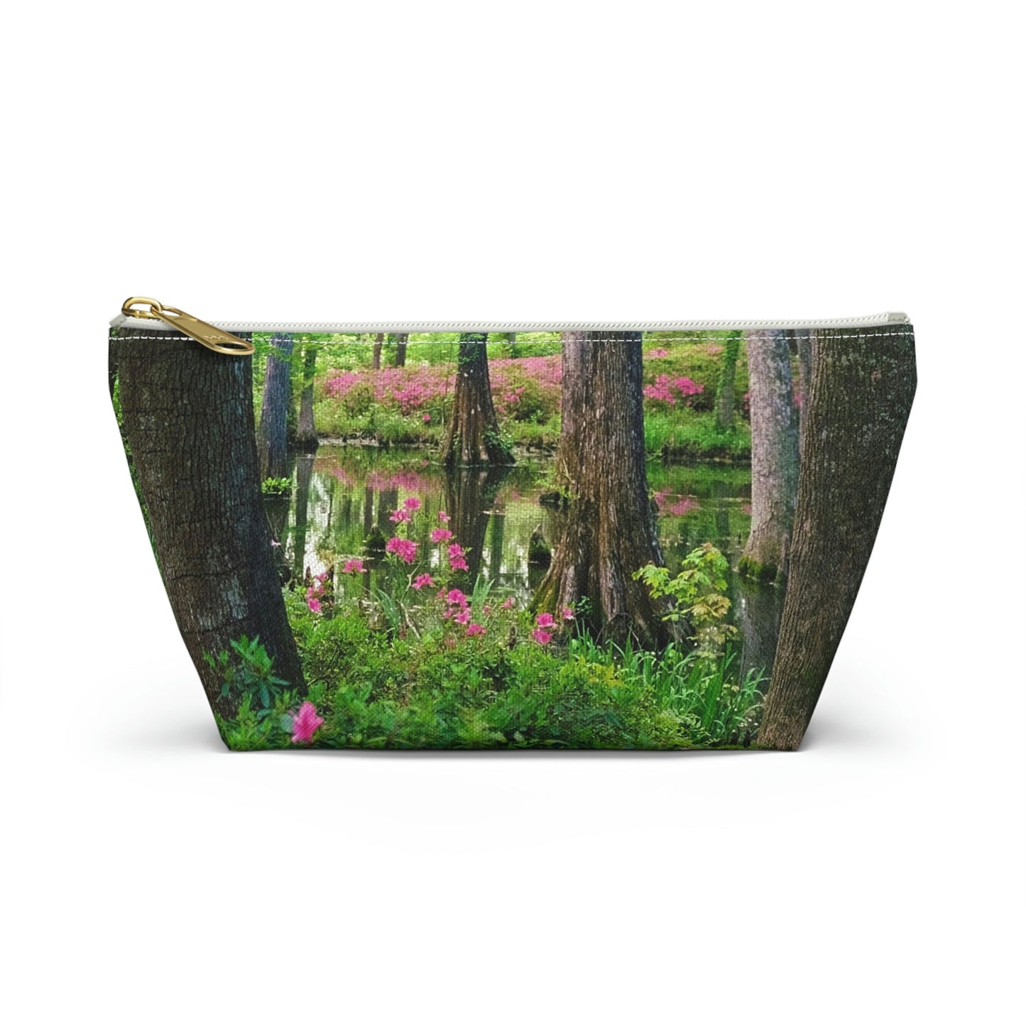 Front view of the small 8.75 x 4.75 x 2.25 inch kit bag with wetland design and white zipper.