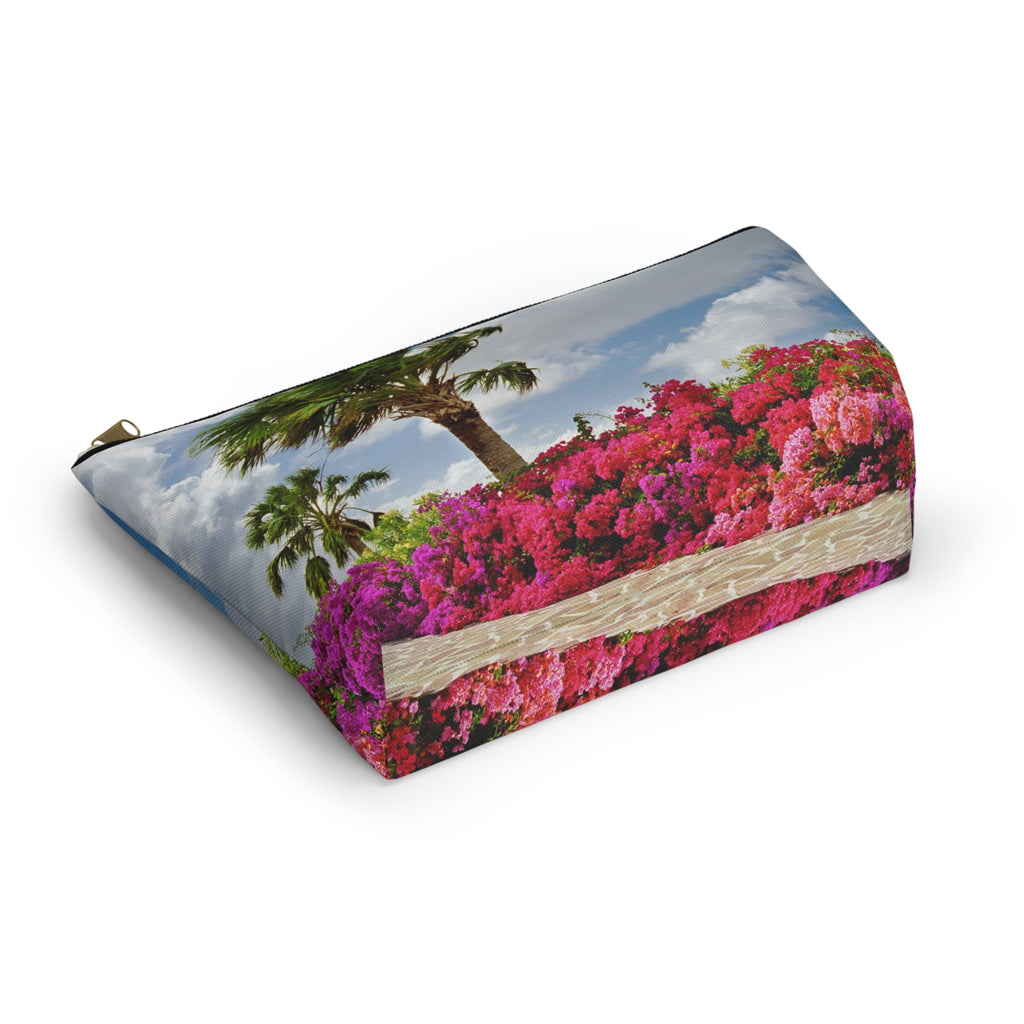 Bottom view of the kit bag with tropical flowers design angled to showcase the depth and all over print design.
