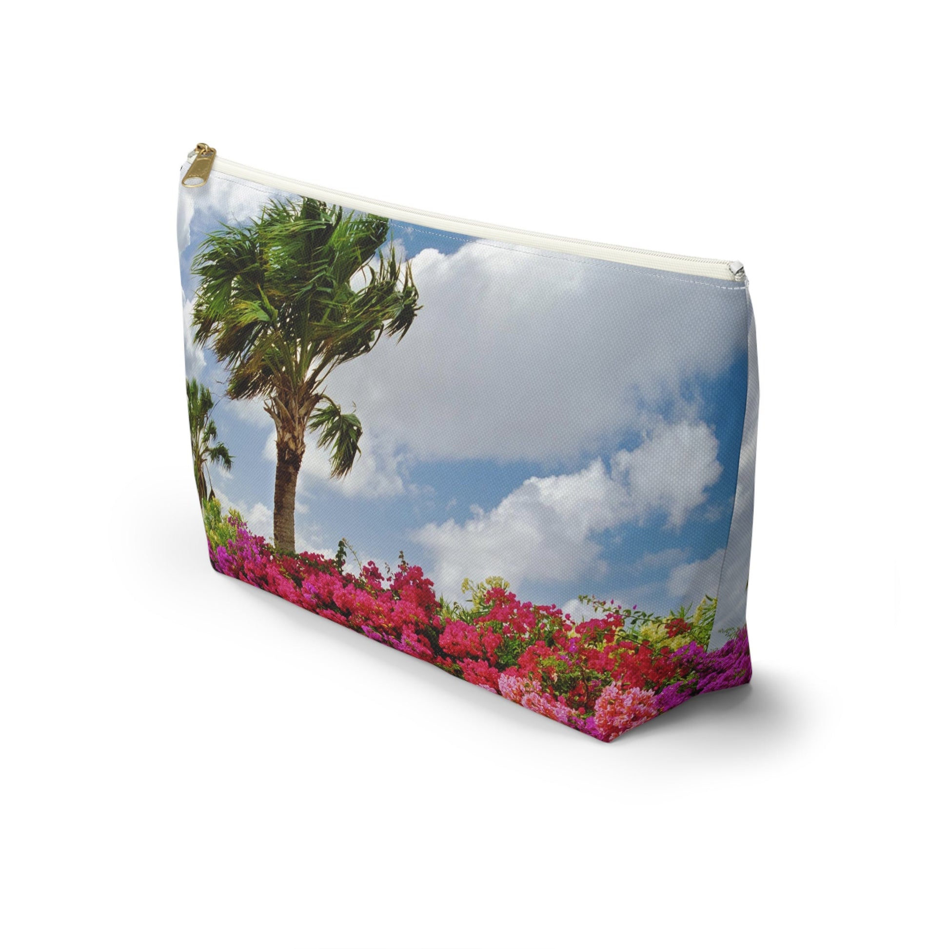 Front view of the kit bag with tropical flowers design angled to showcase the depth and all over print design.