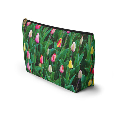 Front view of the kit bag with multi colored tulips design angled to showcase the depth and all over print design.