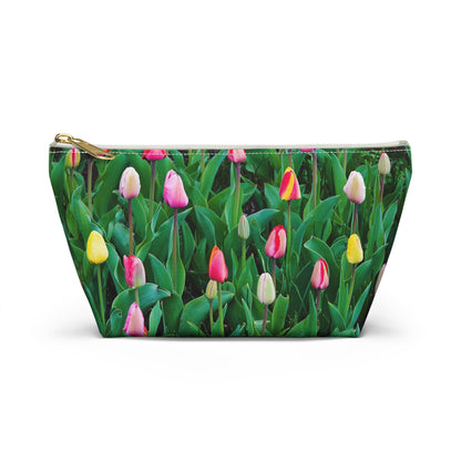 Front view of the small 8.75 x 4.75 x 2.25 inch kit bag with multi colored tulips design and white zipper.