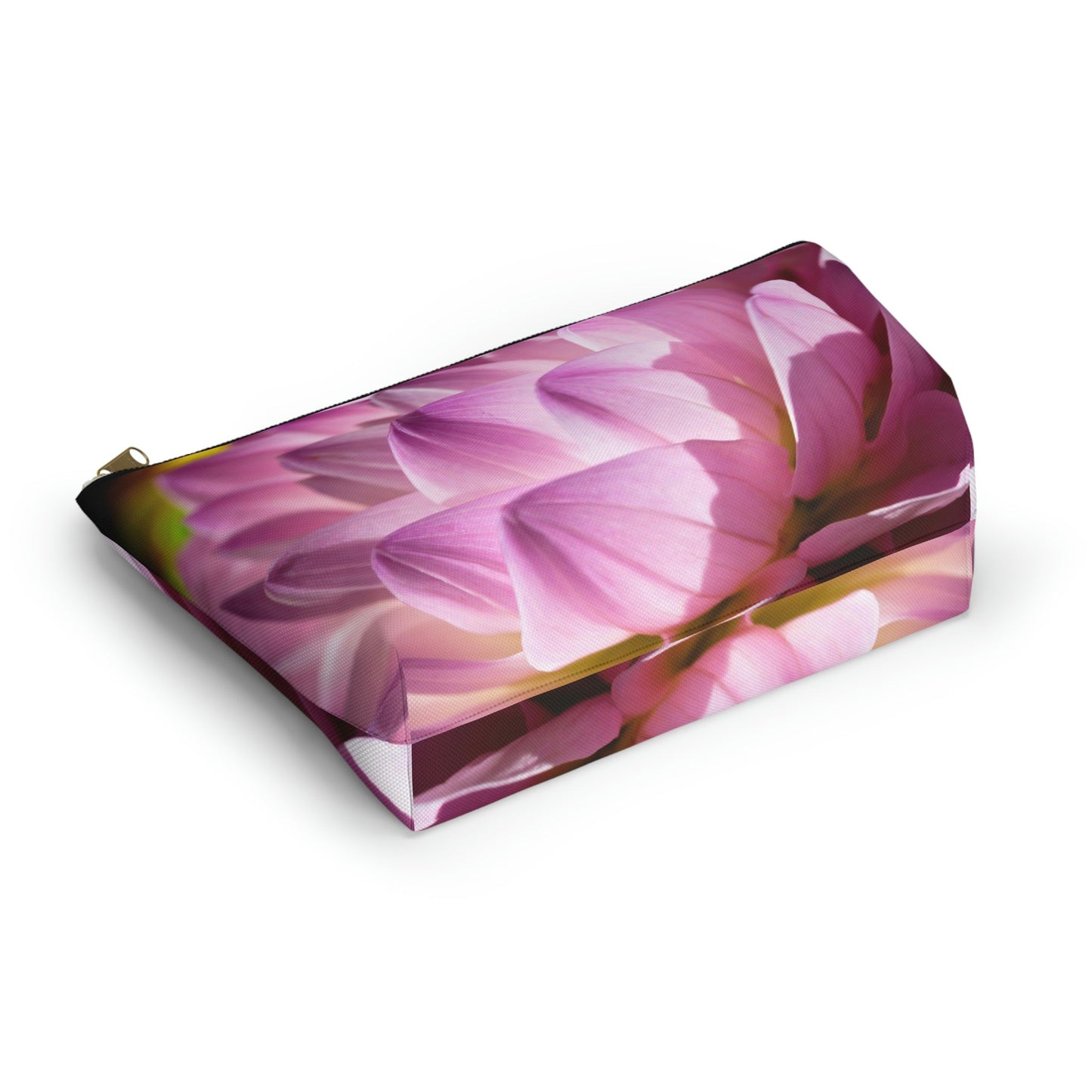 Bottom view of the kit bag with flower petals design angled to showcase the depth and all over print design.
